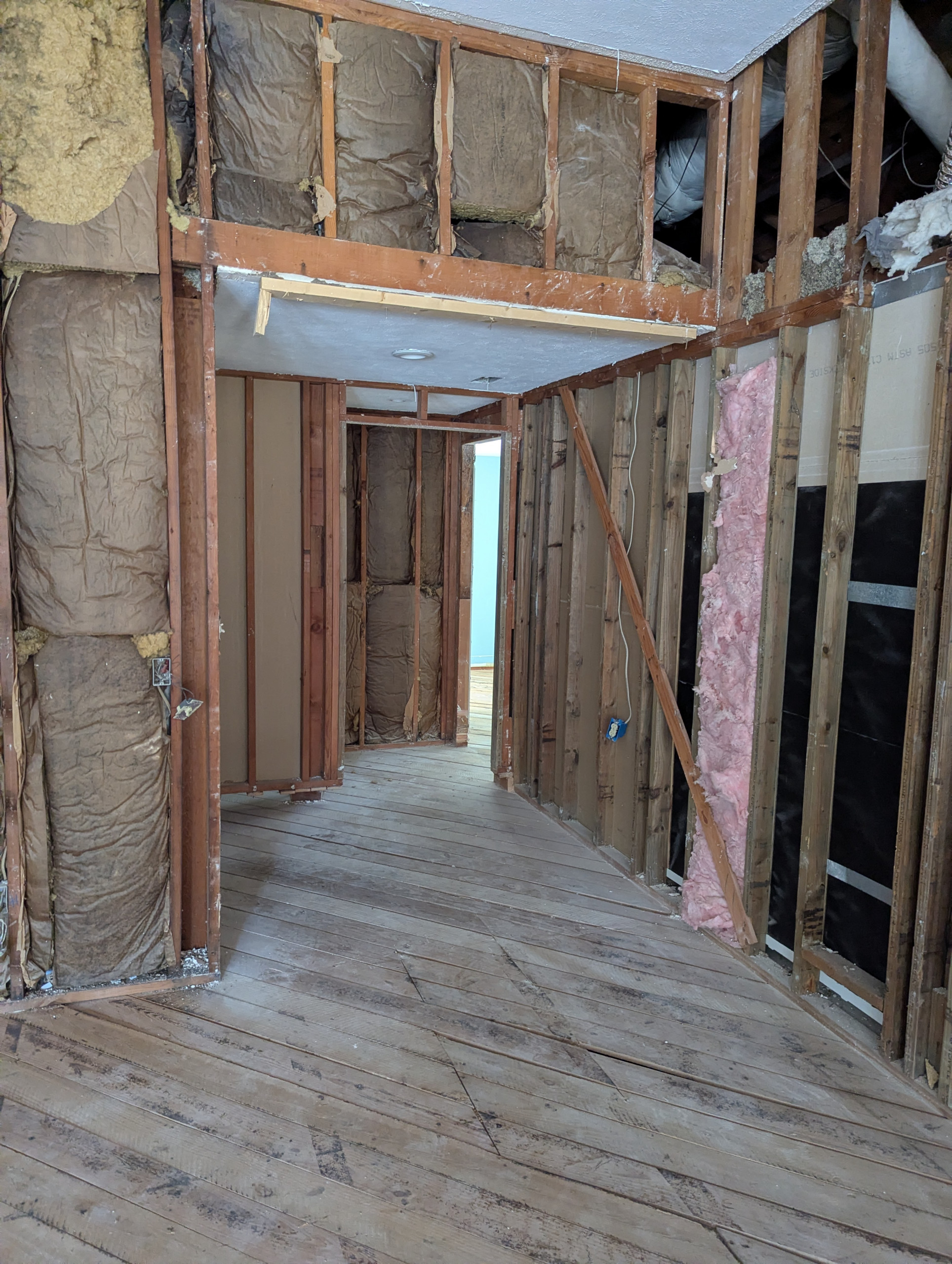 Mechanical Chase : Clearing - Airflow	The removal of old ductwork and bulkheads has opened up the vertical chase. This allows for a more efficient HVAC layout, maximizing ceiling height and improving