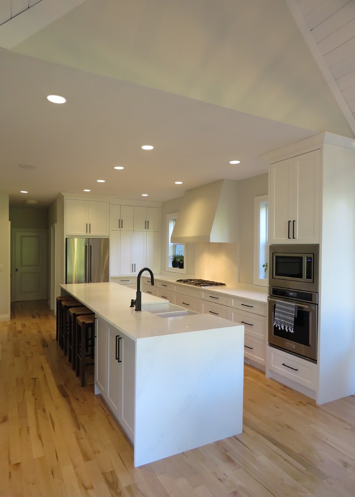 Example of a transitional kitchen design in Vancouver