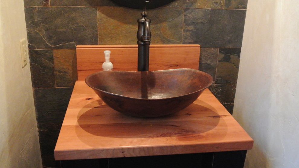 Photo of a country bathroom in Denver with a vessel sink.