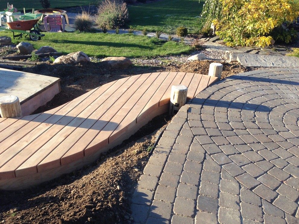 Example of a mountain style patio design in Edmonton