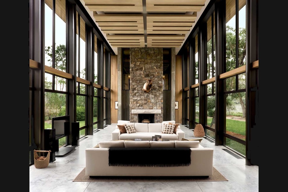 Large trendy formal and open concept limestone floor living room photo in Other with beige walls, a standard fireplace and a stone fireplace