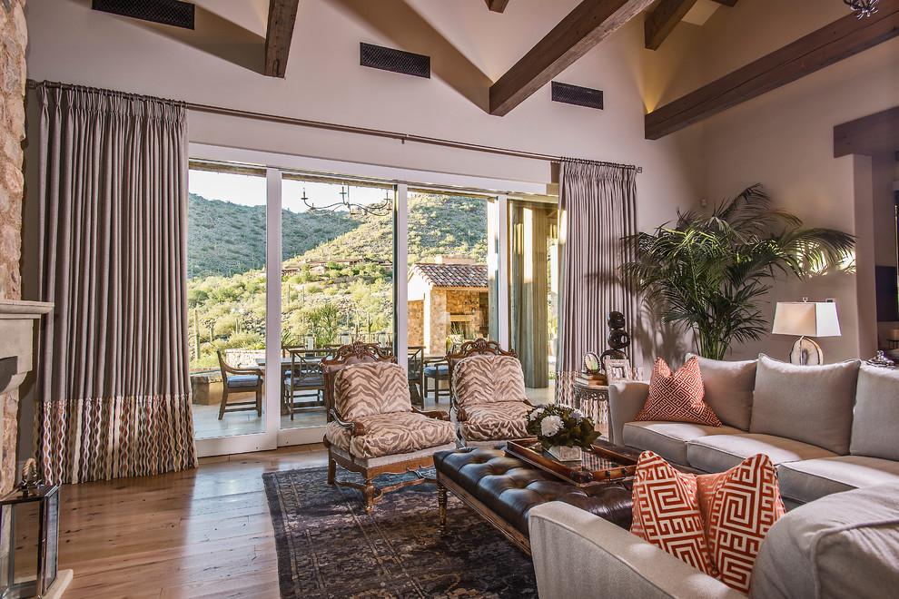 Inspiration for a large transitional formal and enclosed light wood floor living room remodel in Phoenix with beige walls and a standard fireplace