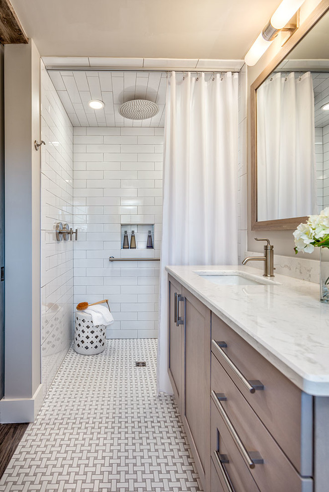Inspiration for a transitional 3/4 bathroom in Other with light wood cabinets, a curbless shower, white tile, subway tile, grey walls, an undermount sink and a shower curtain.