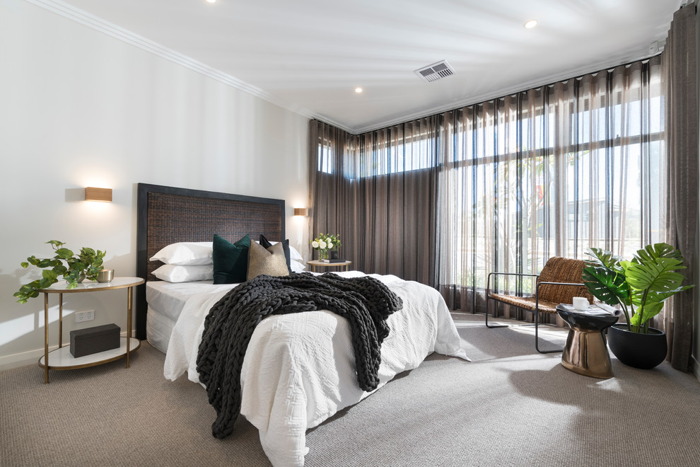 This is an example of a large contemporary master bedroom in Perth with white walls, carpet and grey floor.