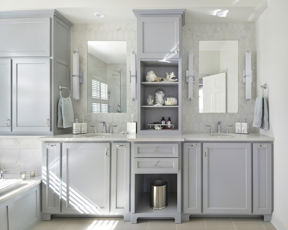 Photo of a transitional master bathroom in Atlanta with recessed-panel cabinets.