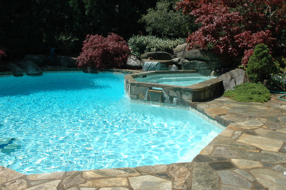 Inspiration for a mediterranean swimming pool in Charlotte.