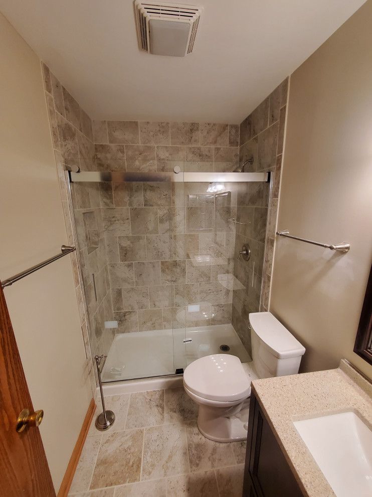 New tub and shower with sliding glass doors