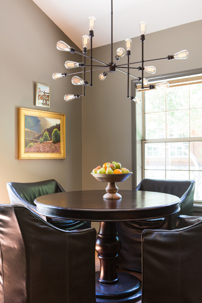This is an example of a country dining room in Los Angeles with brown walls.