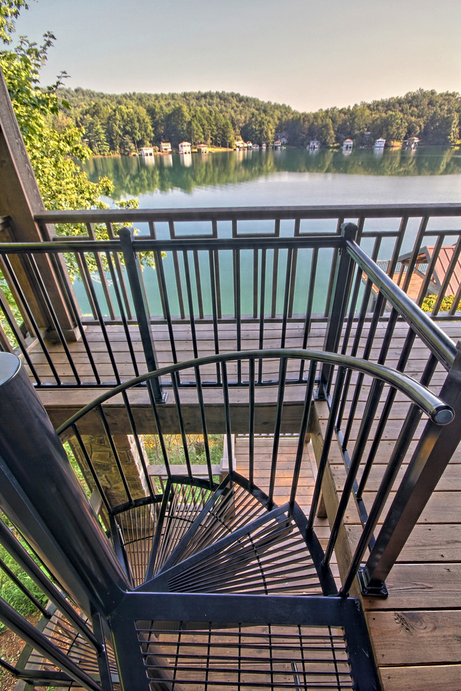 Design ideas for a large country metal spiral staircase in Atlanta with metal risers.