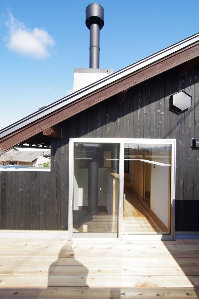 他の地域にあるアジアンスタイルのおしゃれなベランダ・バルコニー (日よけなし) の写真