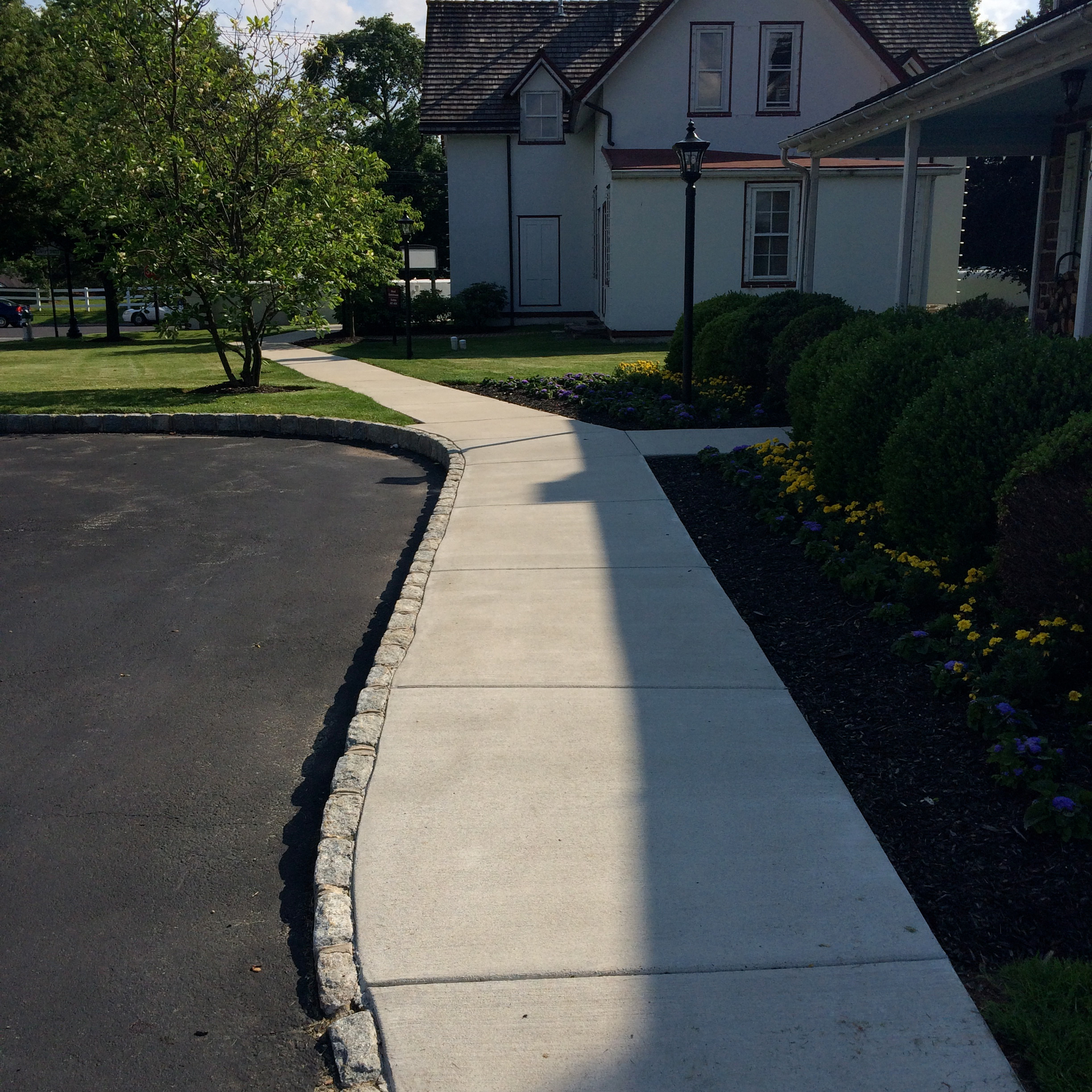 Normandy Farms- Blue Bell- Concrete with Granite Cobble curb