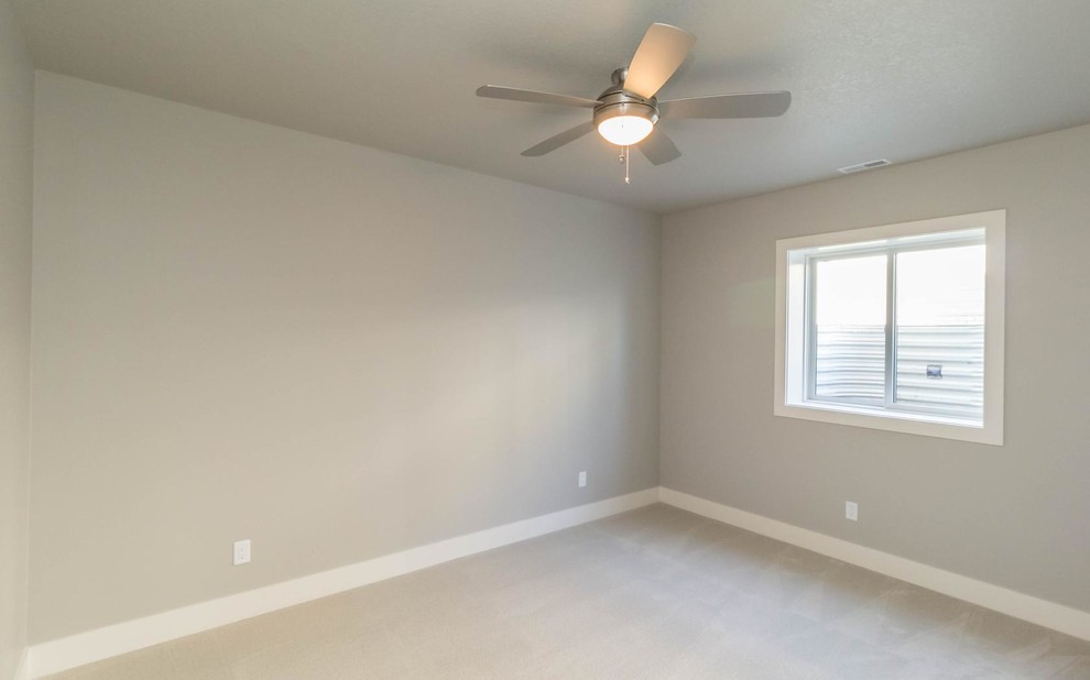 Mid-sized transitional guest carpeted home design photo with gray walls and no fireplace
