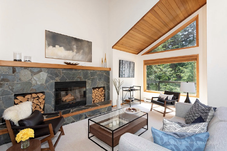 Example of a large transitional home design design