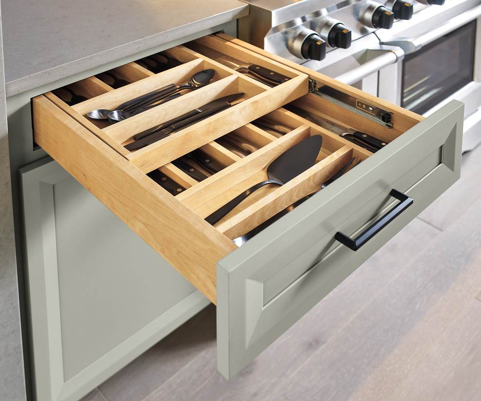 Inspiration for a transitional eat-in kitchen remodel in Other with stainless steel appliances and an island
