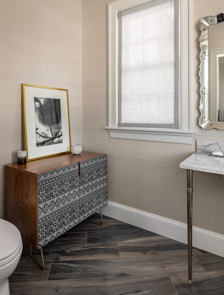 This is an example of a transitional powder room in New York.