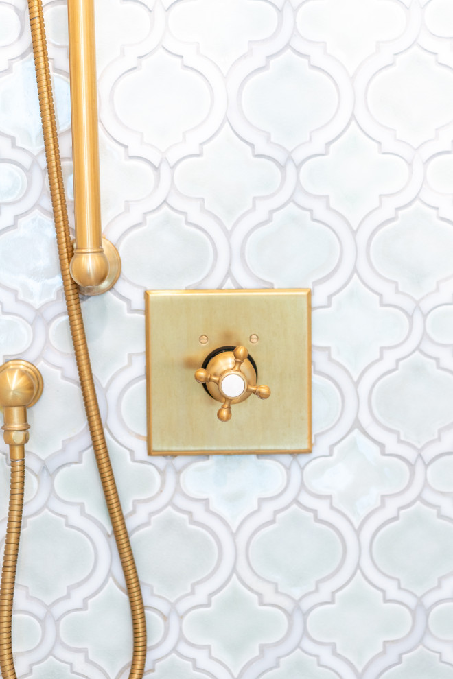 Golden Shower Head in Modern Bathroom with Tiled Walls