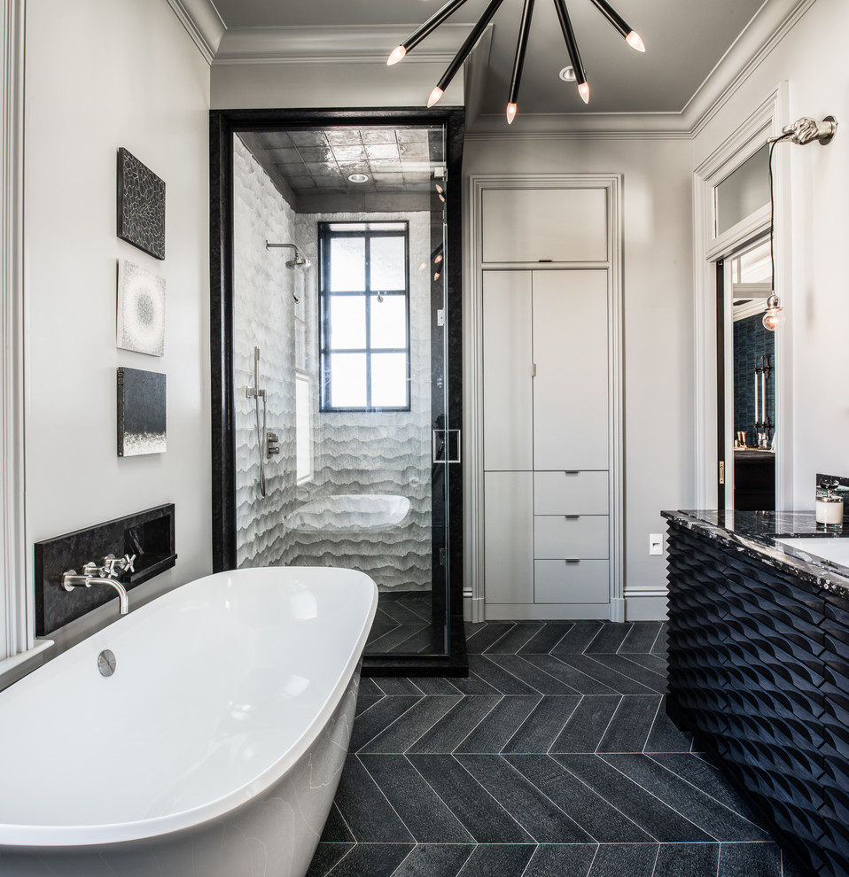 Transitional master gray tile black floor freestanding bathtub photo in San Francisco with black cabinets, white walls, a hinged shower door, an undermount sink, black countertops and flat-panel cabinets