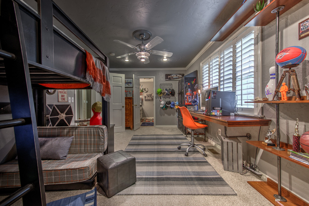 Design ideas for a mid-sized industrial kids' room for boys in Oklahoma City with grey walls and carpet.