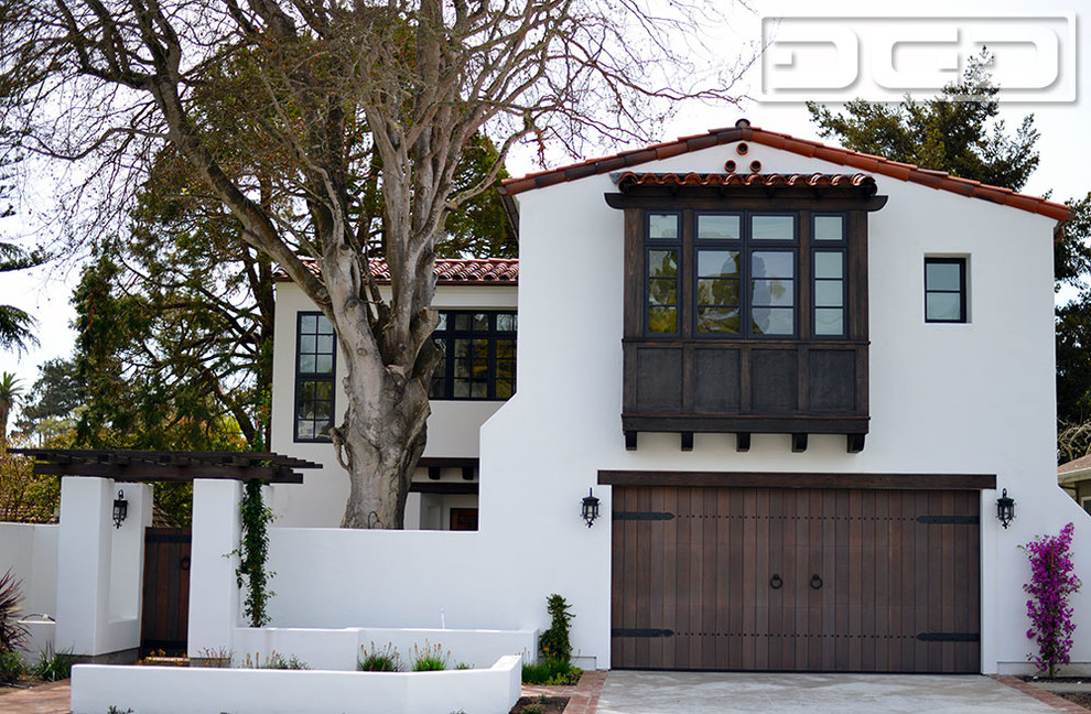 Large mediterranean white two-story stucco exterior home idea in San Francisco