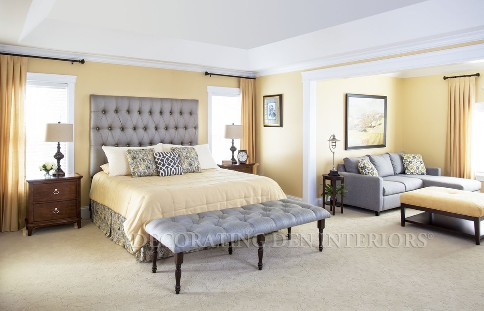 Expansive transitional master bedroom in Miami with yellow walls, carpet and no fireplace.