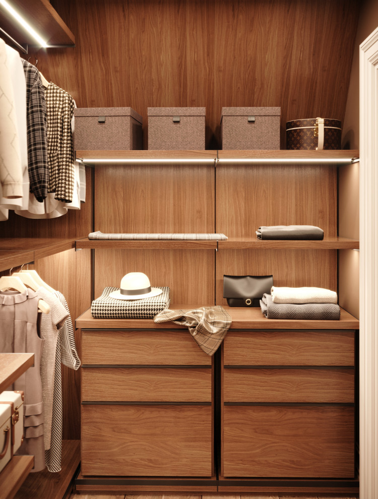 Inspiration for a mid-sized modern gender-neutral medium tone wood floor and wood ceiling walk-in closet remodel in London with flat-panel cabinets and medium tone wood cabinets