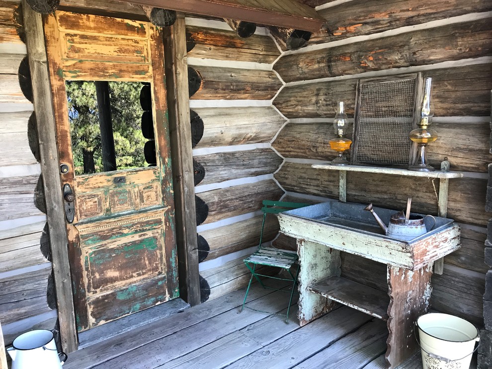 Deck - mid-sized rustic backyard deck idea