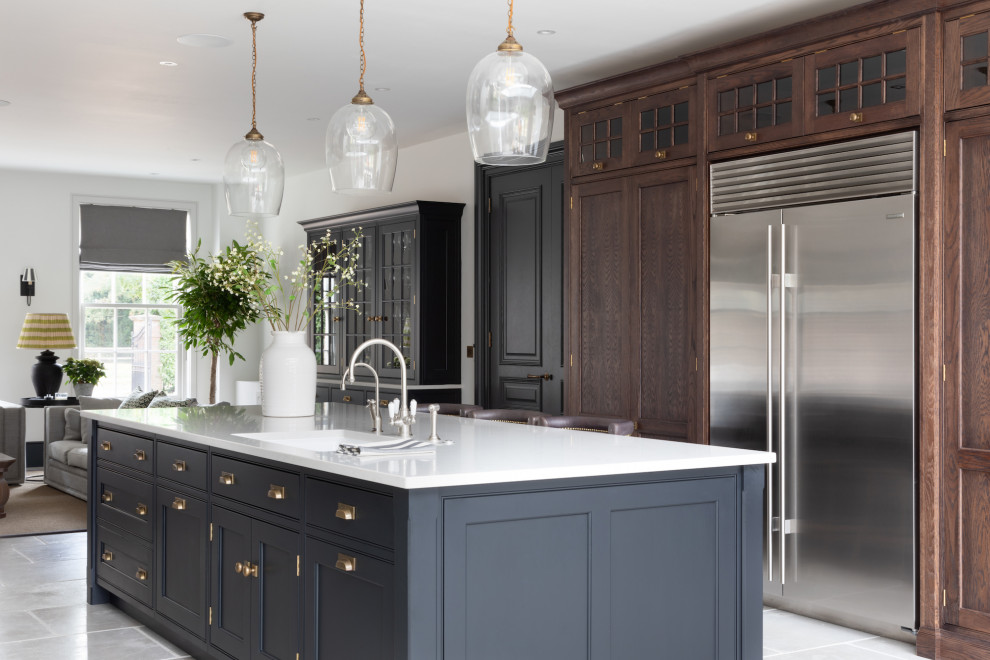 Photo of a transitional kitchen in Surrey.
