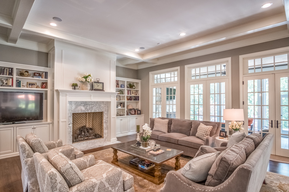Design ideas for a large transitional open concept family room in Other with grey walls, medium hardwood floors, a standard fireplace, a stone fireplace surround and a built-in media wall.