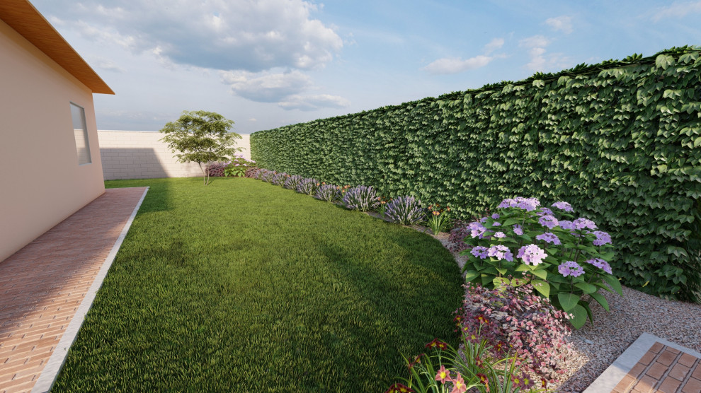 Esempio di un grande giardino formale moderno esposto a mezz'ombra davanti casa in primavera con gazebo, pavimentazioni in mattoni e recinzione in metallo
