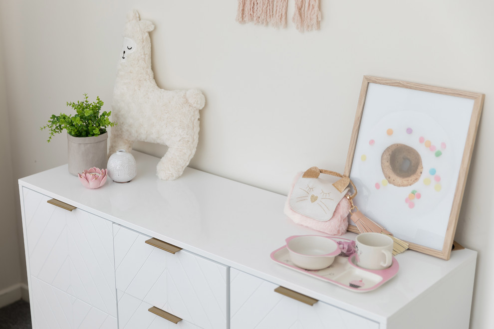 Design ideas for a beach style kids' room in Other.