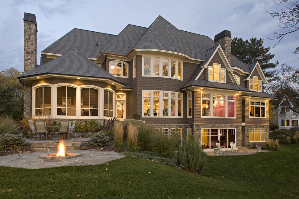 Design ideas for a traditional three-storey exterior in Minneapolis.