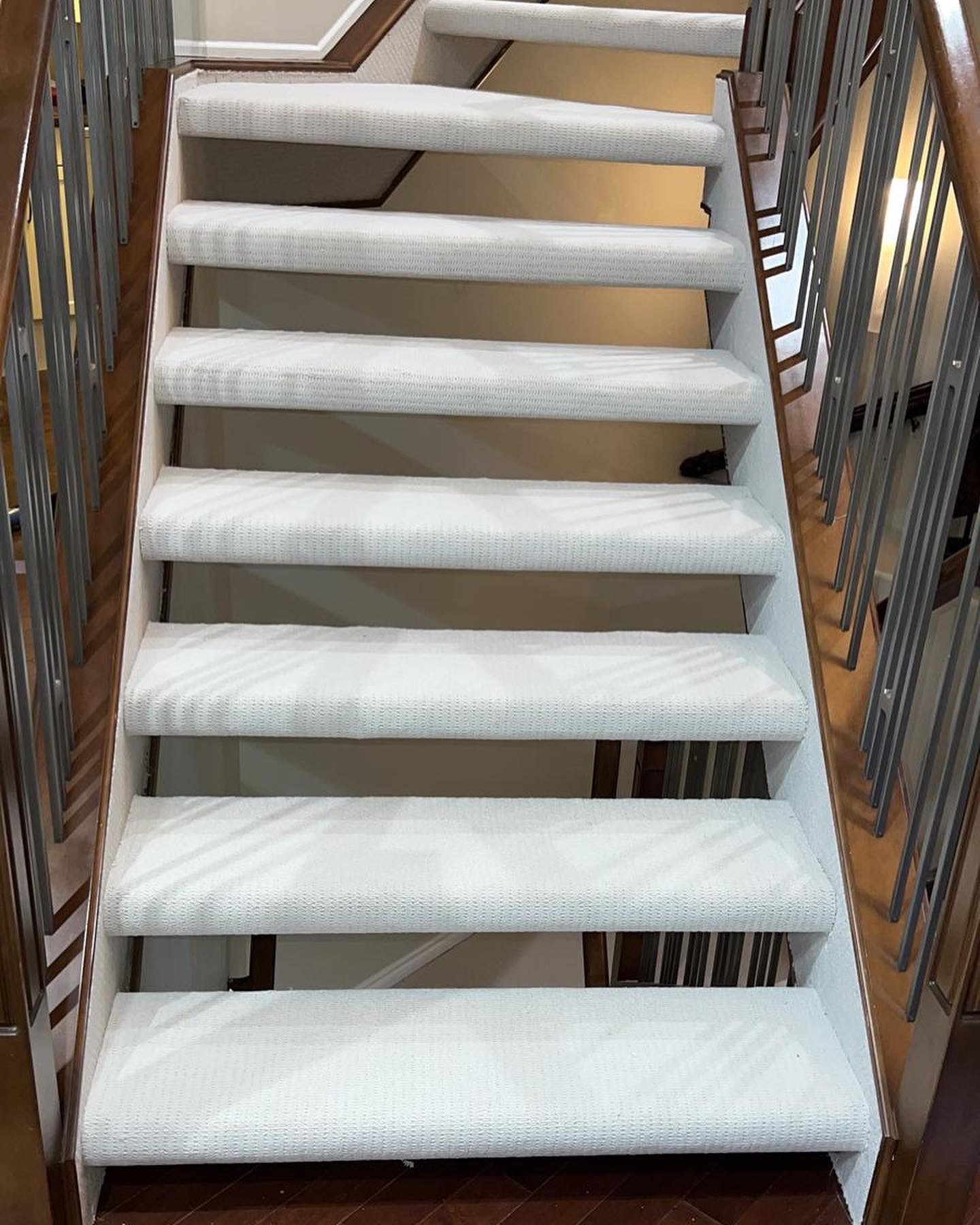 Wrap Around Open Stairs White Carpet