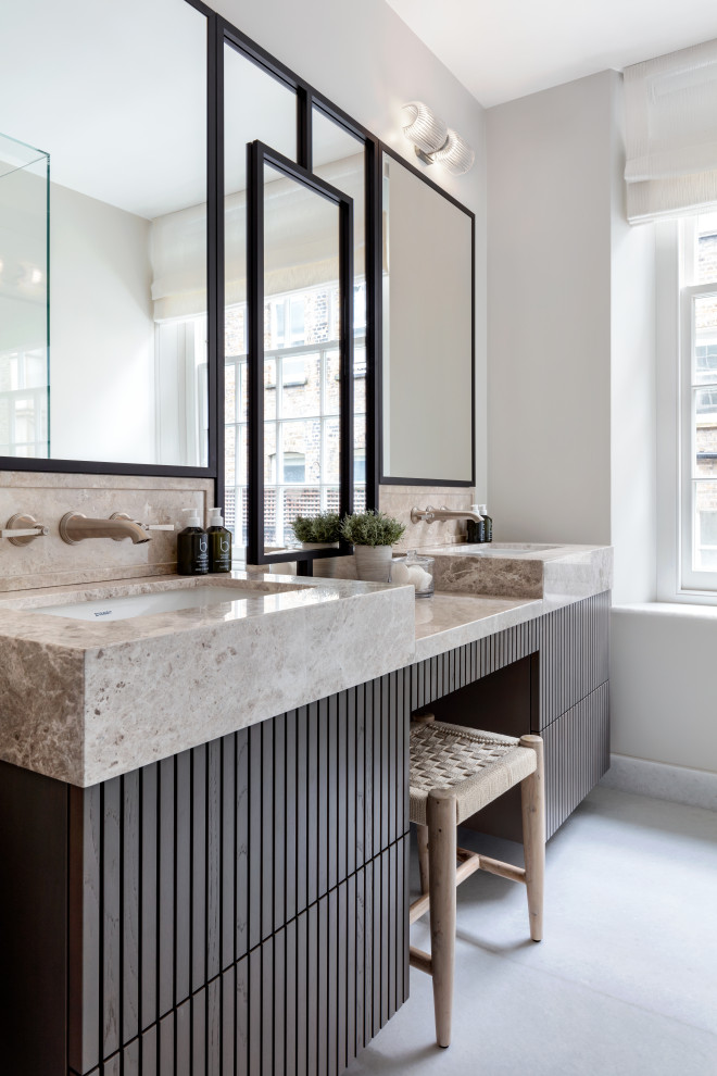 Mid-sized contemporary master bathroom in London with brown cabinets, beige tile, marble benchtops, beige floor, beige benchtops, a double vanity, a floating vanity and flat-panel cabinets.