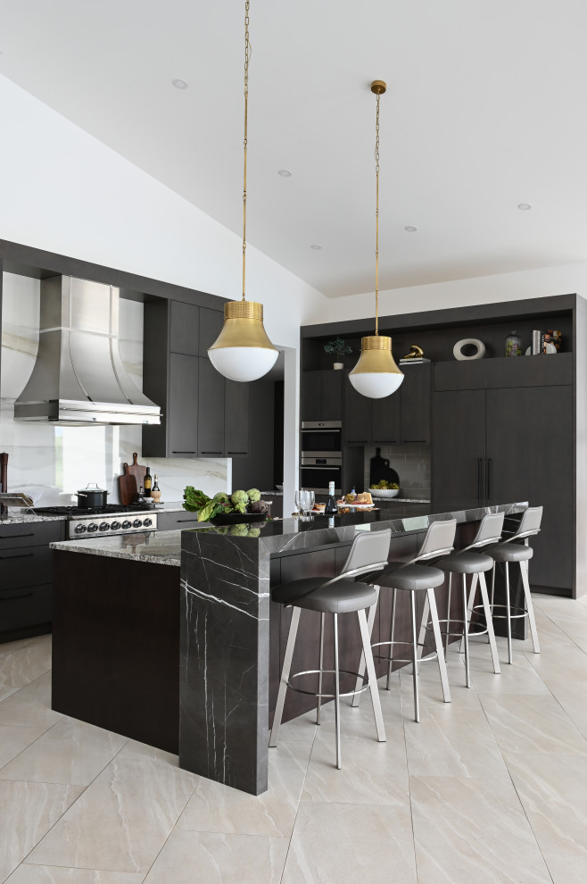 Example of a huge trendy l-shaped porcelain tile and vaulted ceiling open concept kitchen design in Vancouver with flat-panel cabinets, dark wood cabinets, marble countertops, white backsplash, quartz backsplash, stainless steel appliances, an island and gray countertops