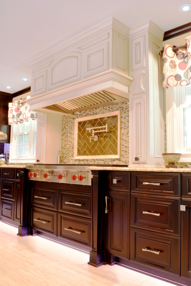 Inspiration for a large transitional u-shaped porcelain tile eat-in kitchen remodel in Charlotte with a farmhouse sink, furniture-like cabinets, dark wood cabinets, granite countertops, gray backsplash, stainless steel appliances, beige walls and two islands