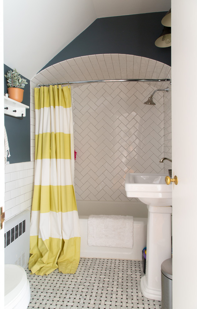 Photo of a country 3/4 bathroom in Chicago with a corner tub, a shower/bathtub combo, white tile, subway tile, blue walls, mosaic tile floors, a pedestal sink, white floor and a shower curtain.