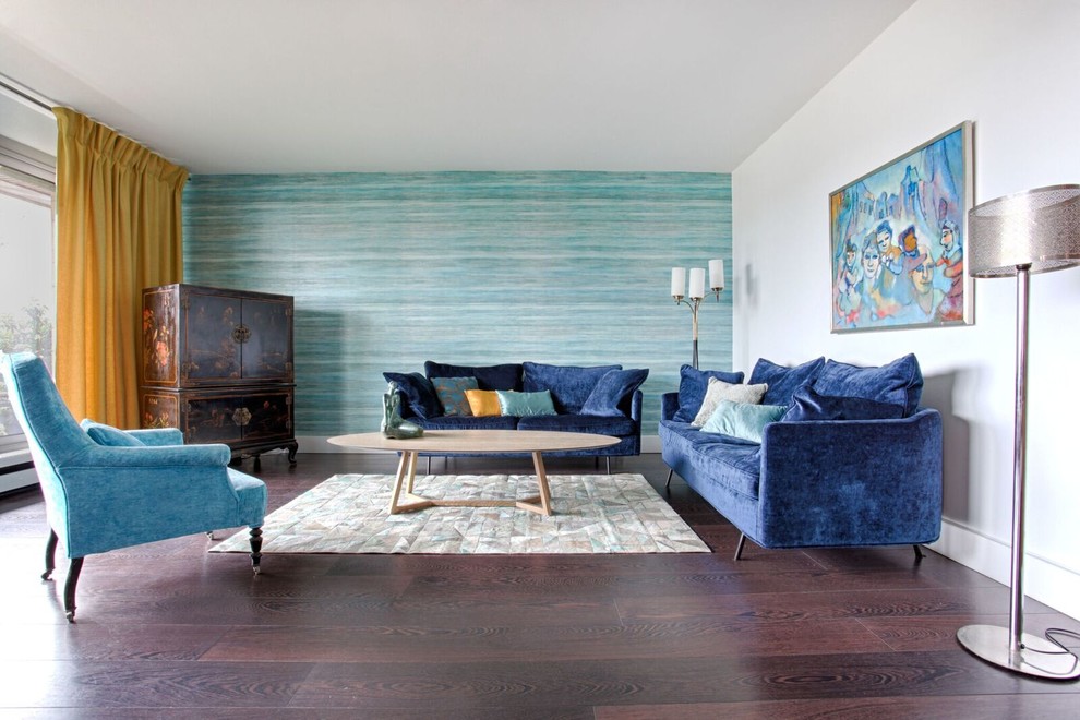 This is an example of a mid-sized contemporary open concept living room in Paris with blue walls, dark hardwood floors, brown floor, no fireplace and no tv.