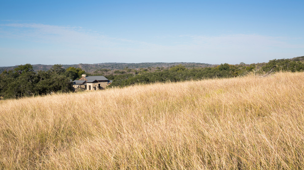 Mountain style home design photo in Austin