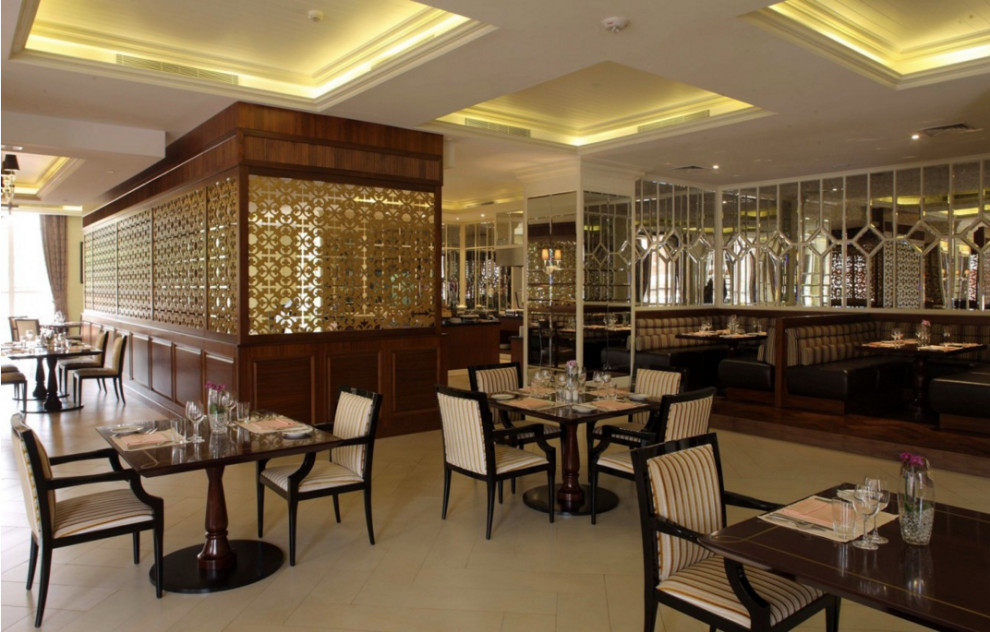 Transitional coffered ceiling dining room photo