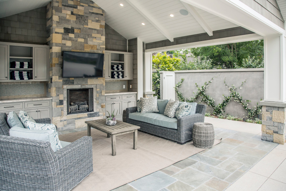 Inspiration for a large transitional backyard patio in Los Angeles with an outdoor kitchen, tile and a gazebo/cabana.