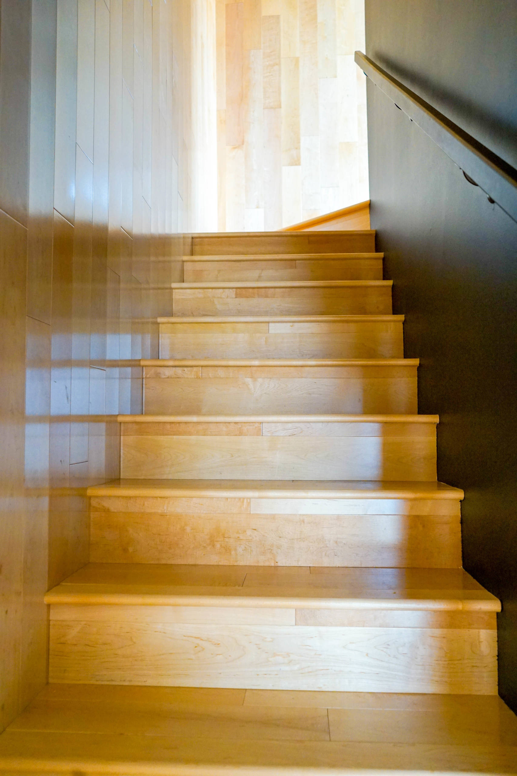 This ADU has it all, with this stunning light wood staircase, the lighter wood which is used upon the reflective light side provides natural light for easy ascension of the stairs.