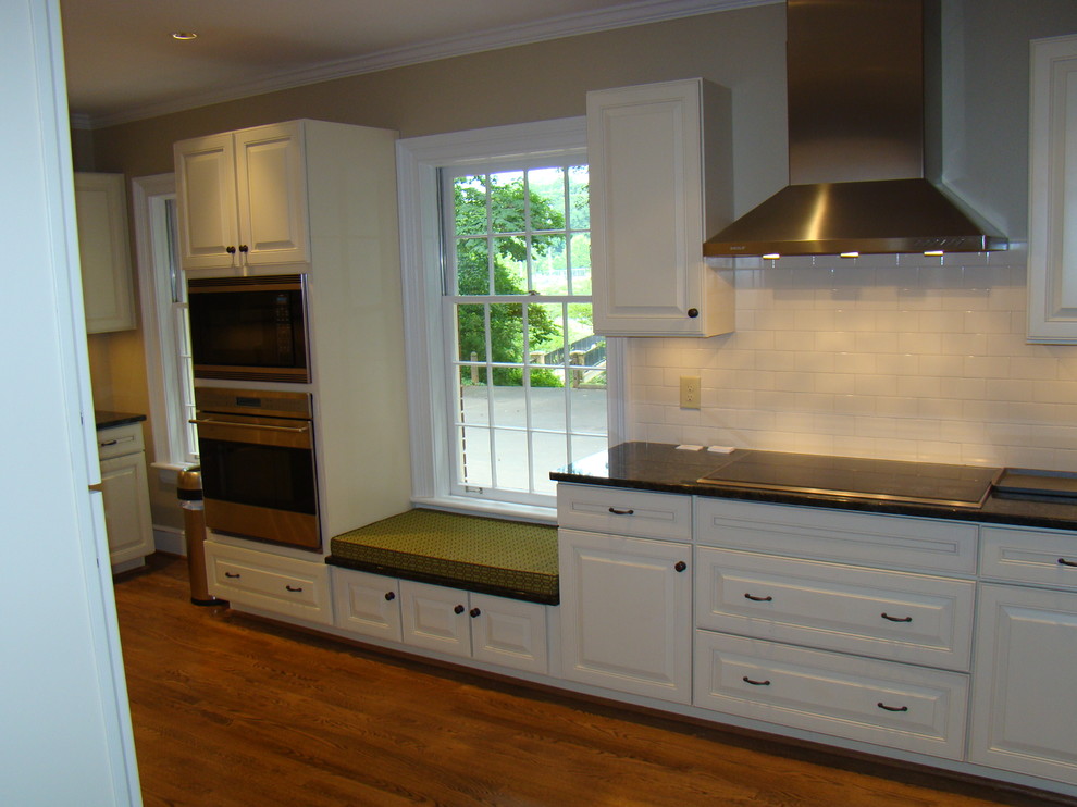 Example of a large transitional kitchen design in Charlotte
