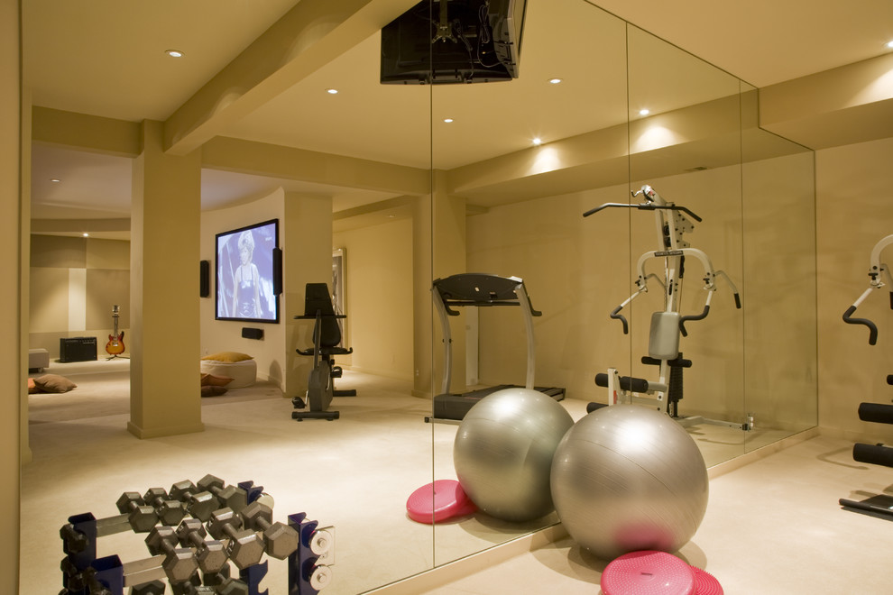 This is an example of a contemporary home gym in DC Metro with beige floor.
