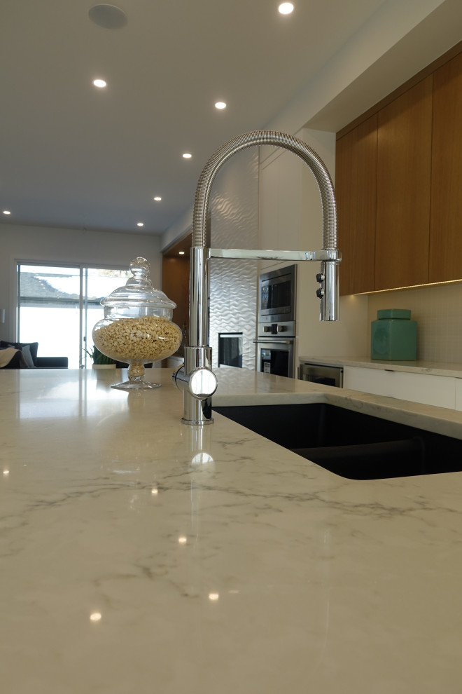 Transitional home design photo in Calgary