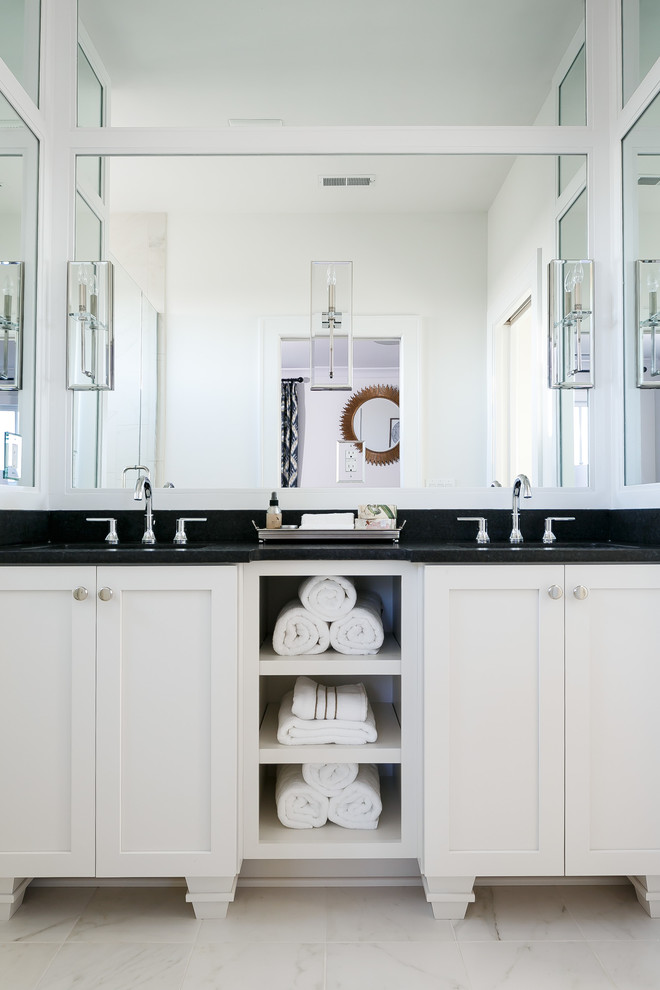 Mid-sized transitional bathroom in Louisville with recessed-panel cabinets, white cabinets, an alcove shower, a drop-in sink and marble floors.