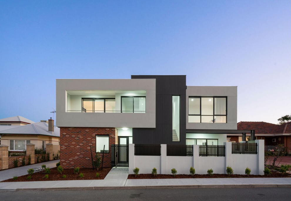 Diseño de fachada de casa pareada actual de dos plantas con revestimiento de aglomerado de cemento