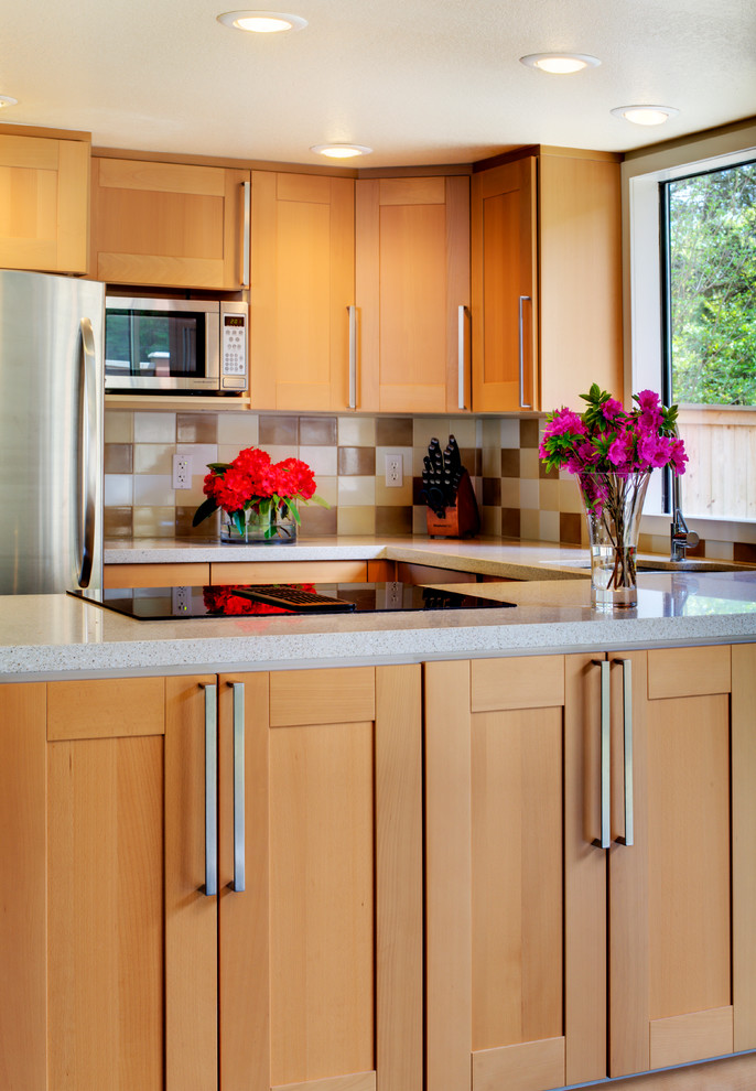 Example of a transitional kitchen design in Seattle
