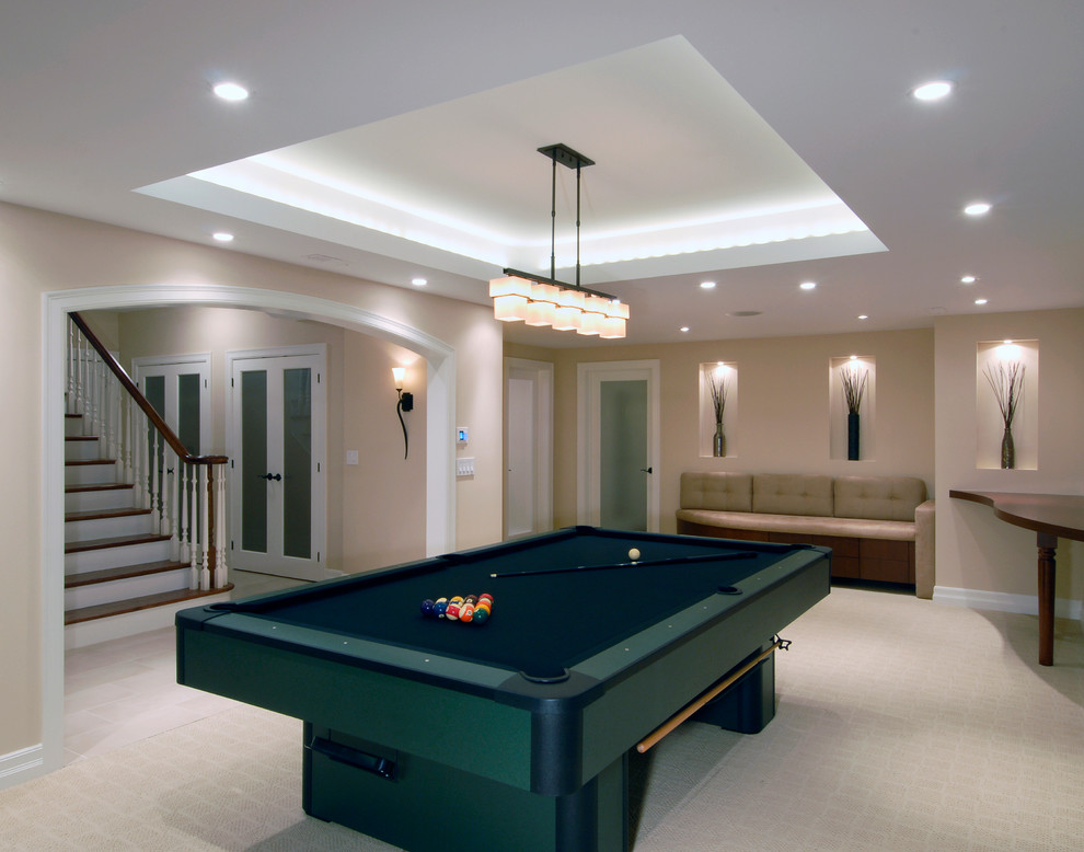 Photo of a mid-sized contemporary basement in Ottawa with beige walls, carpet and grey floor.