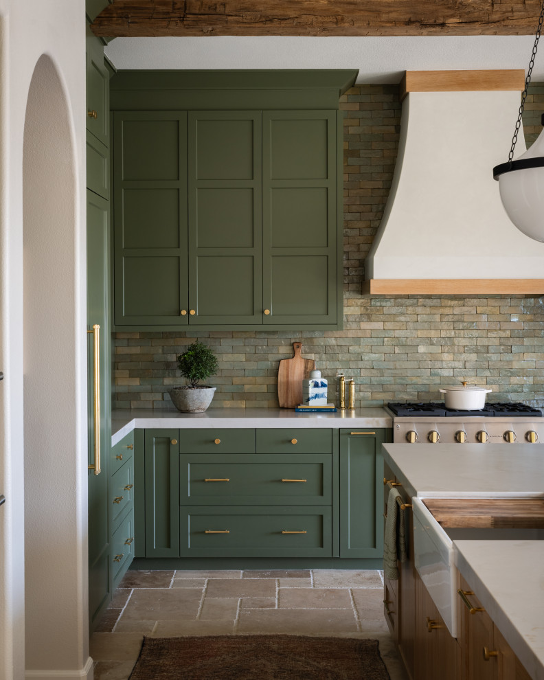 Transitional kitchen photo in Orange County with recessed-panel cabinets, green cabinets, ceramic backsplash and an island