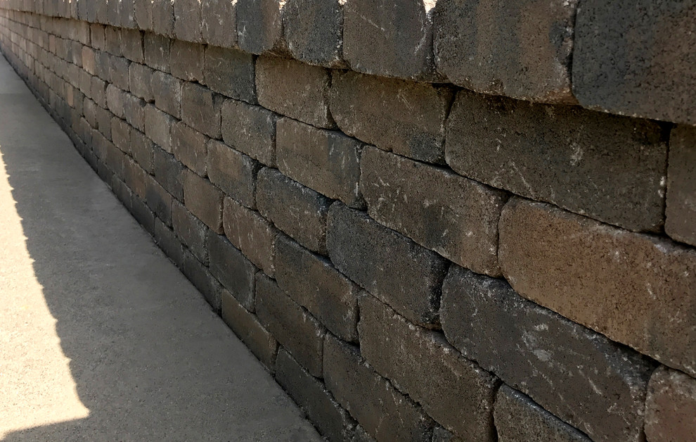 Mountain style front yard concrete paver patio photo in Orange County